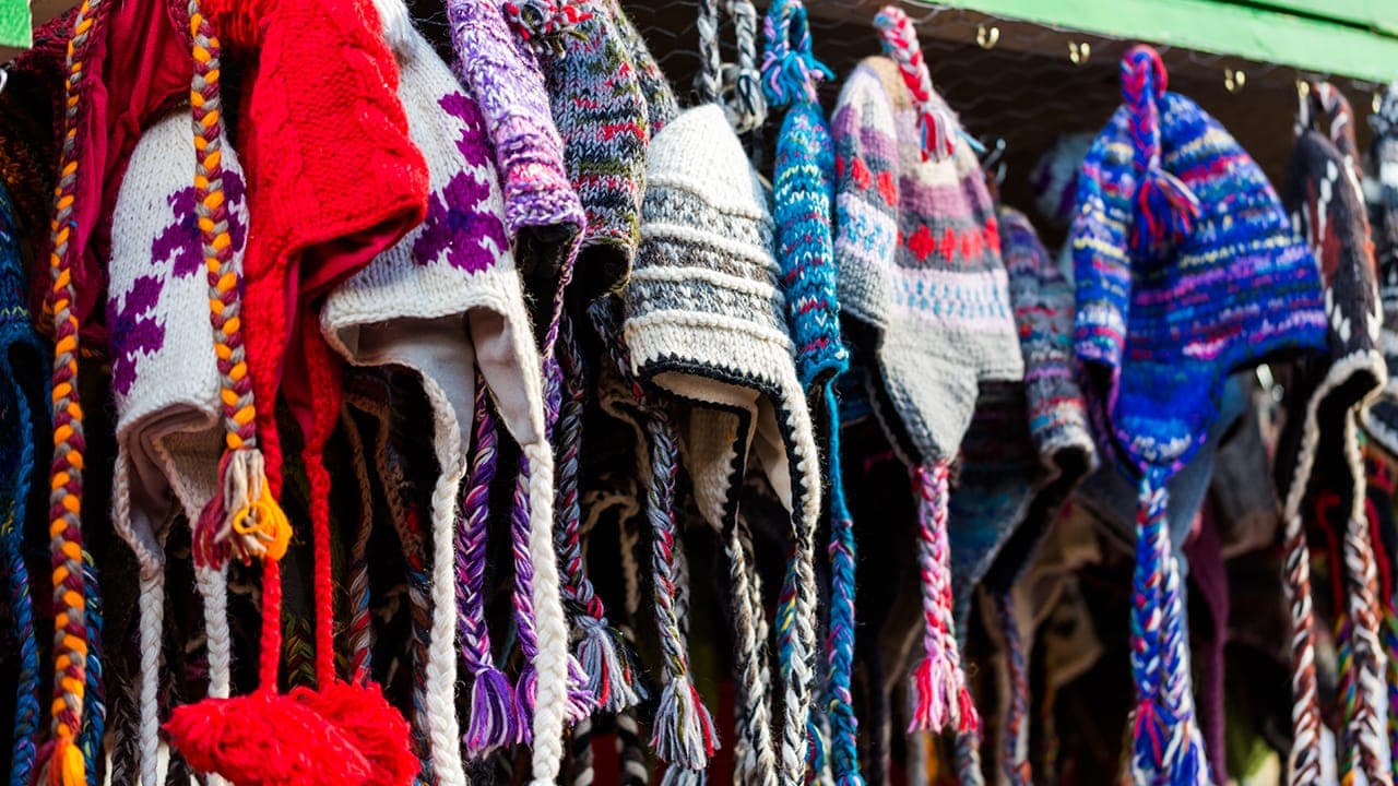 Assortment of handmade wool hats at New Jersey craft fair.