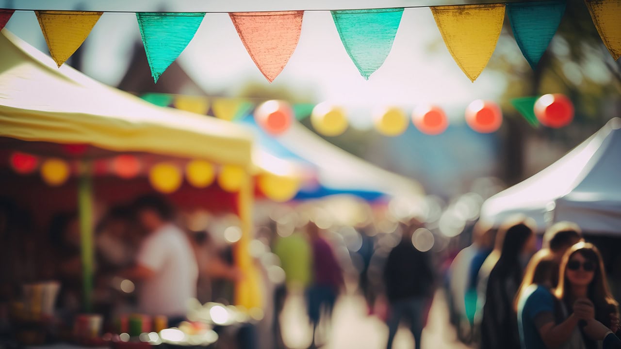 Blurred image of New Jersey street fair. Image produced by More Jersey.