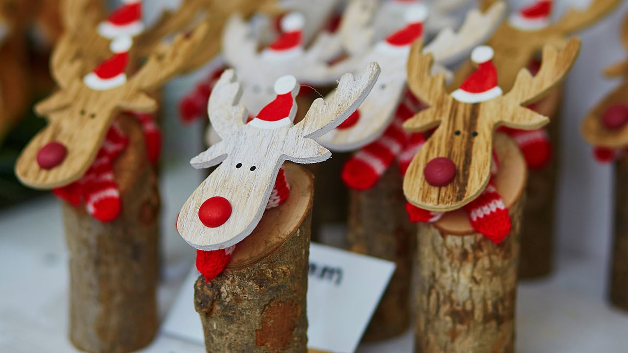 Christmas Rudolph the Red-Nosed Reindeer wooden crafts at New Jersey holiday market fair. Image produced by More Jersey.