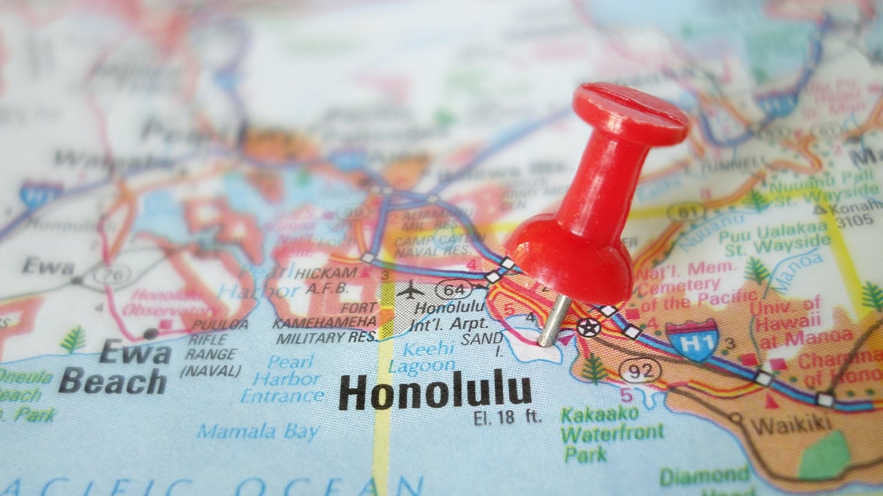 Close-up of Hawaii map with a pin on Honolulu.