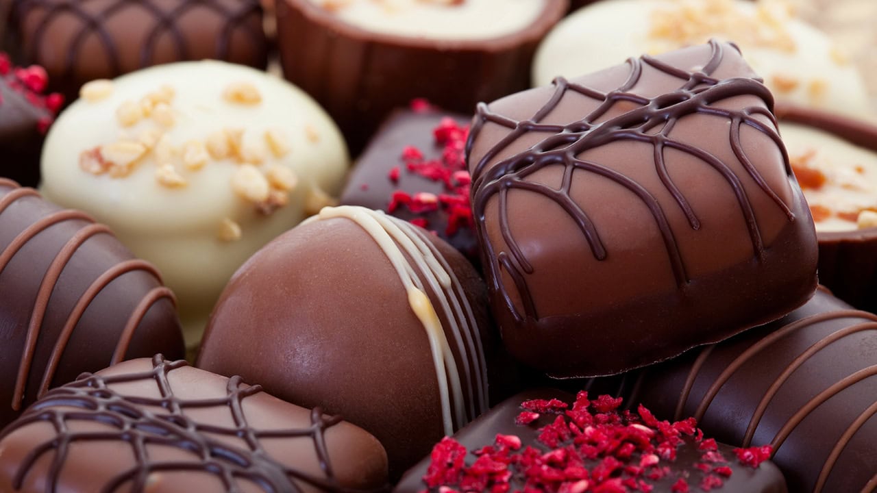 Close-up of an assortment of gourmet chocolates. Image produced by More Jersey.