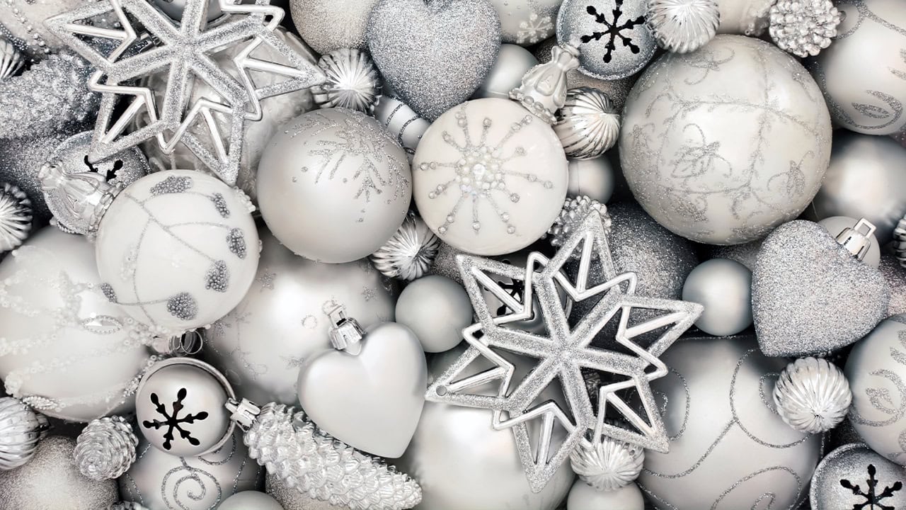 Close-up of an assortment of silver and white Christmas ornaments for New Jersey holiday event. Image produced by More Jersey.