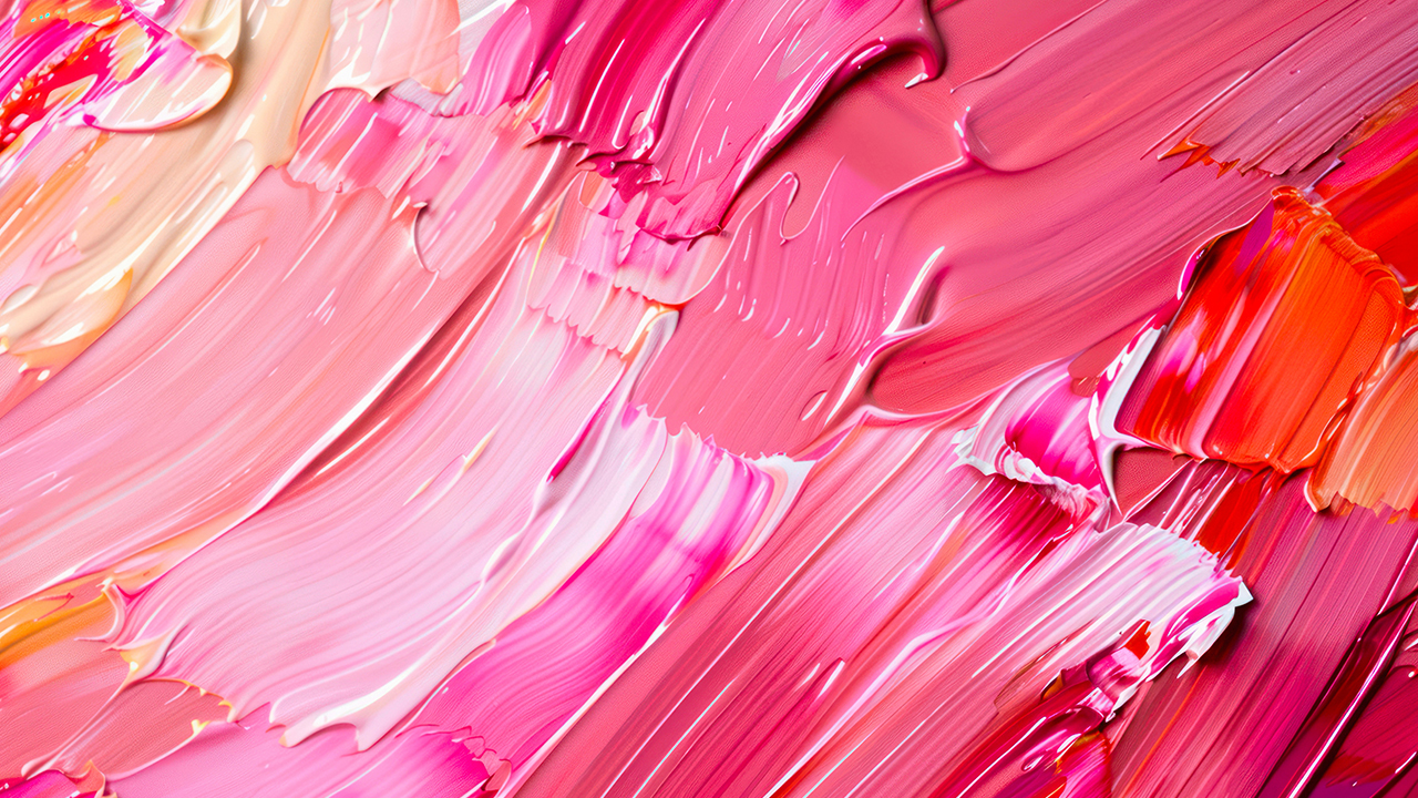 Close-up of pink and white acrylic brush strokes on a canvas. Image produced by More Jersey.