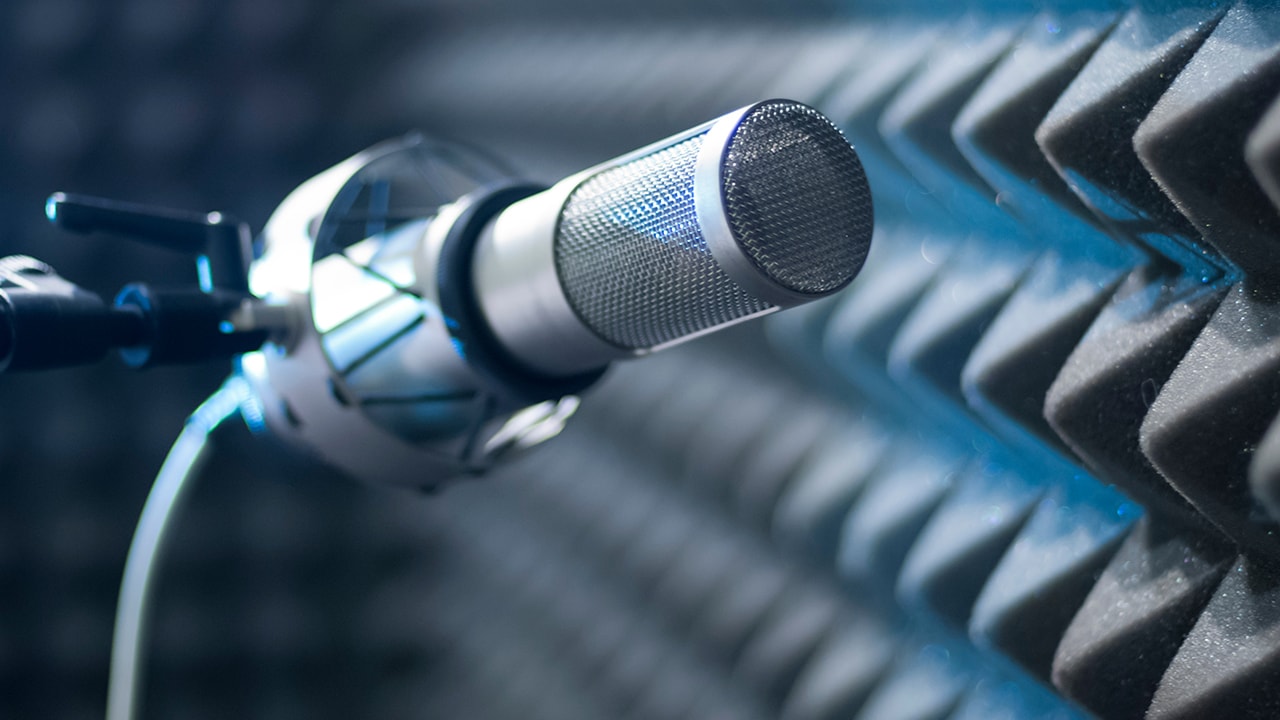 Closeup of studio microphone for voice overs, podcasting, and vocal recording.