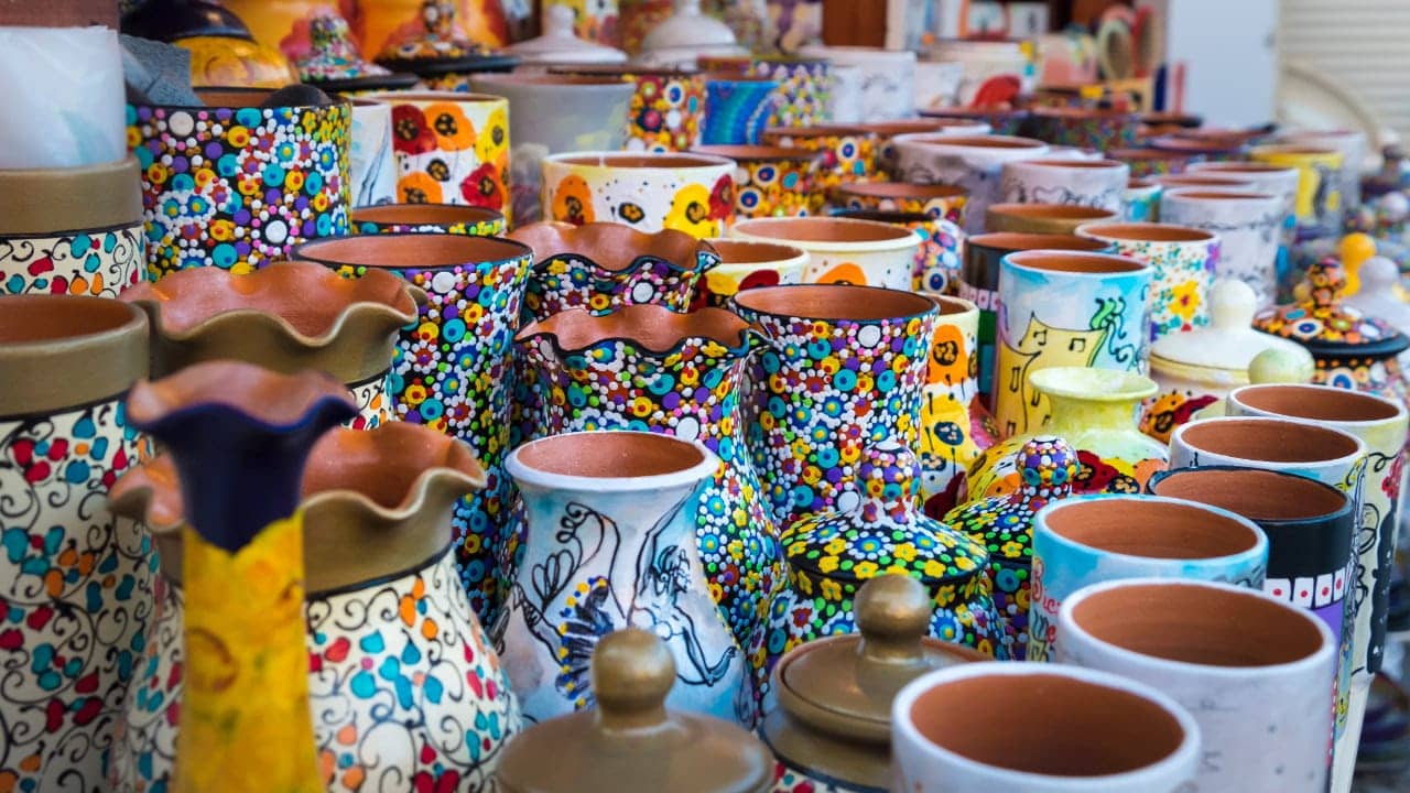 Colorful ceramic pottery on display by New Jersey crafts vendor.