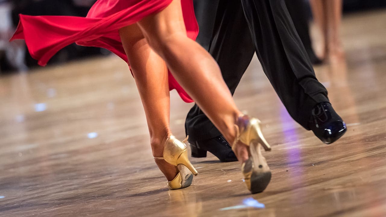 Couple dancing Latin dance at New Jersey dance studio.