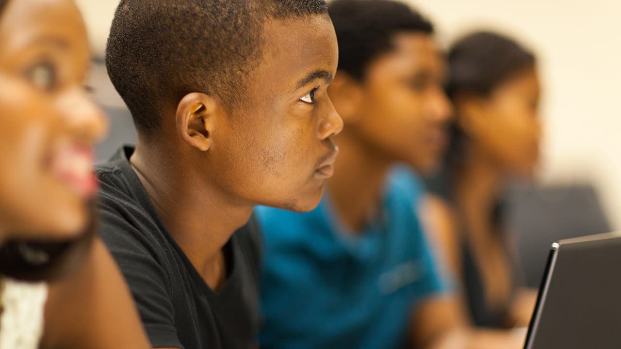 Group of African-American students in class. Image produced by More Jersey.