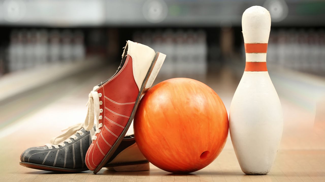 Nicely displayed bowling shoes, pin and ball at New Jersey bowling alley.