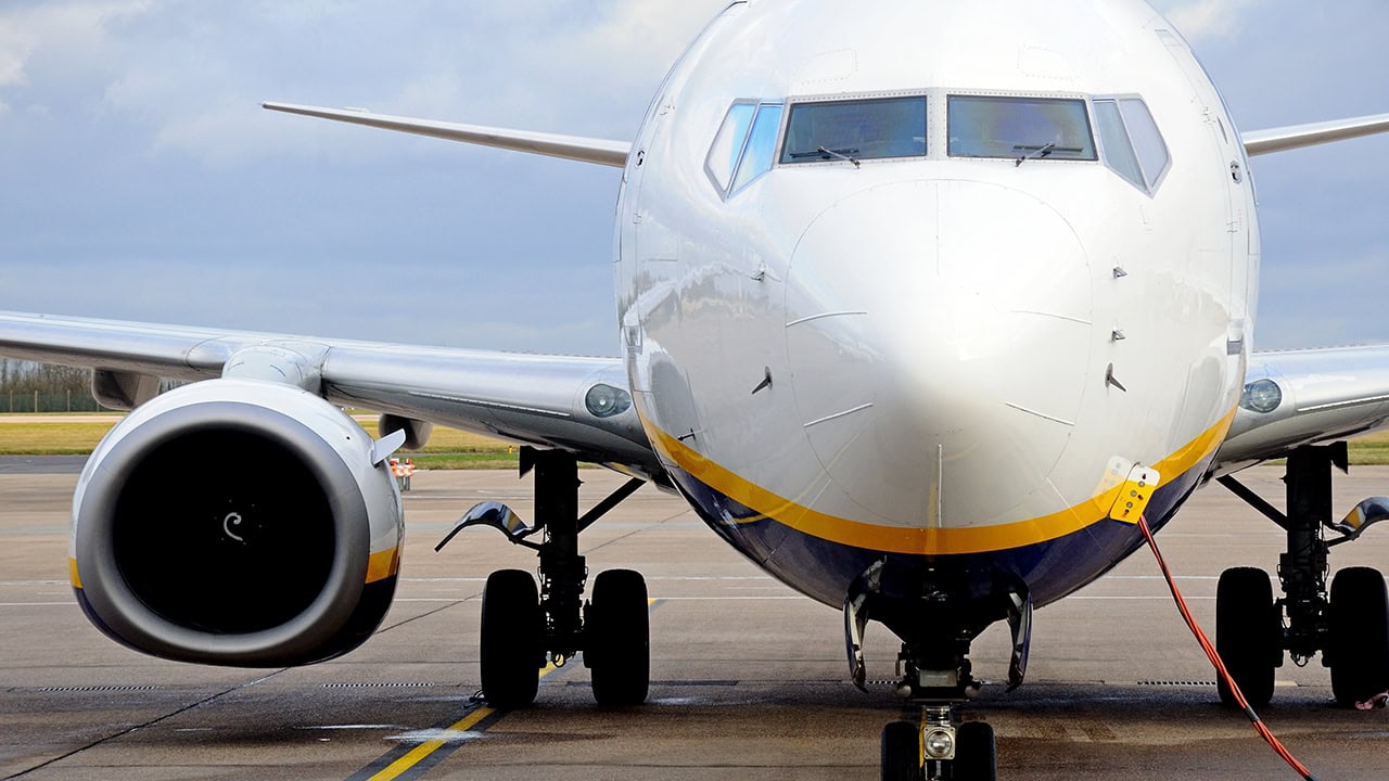 Boeing 737 airplane on runway. Image produced by More Jersey.