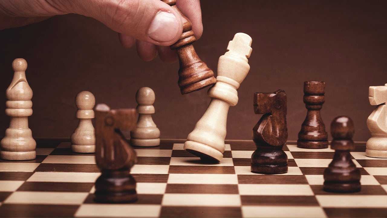 Close-up of a resident playing chess. Image produced by More Jersey.