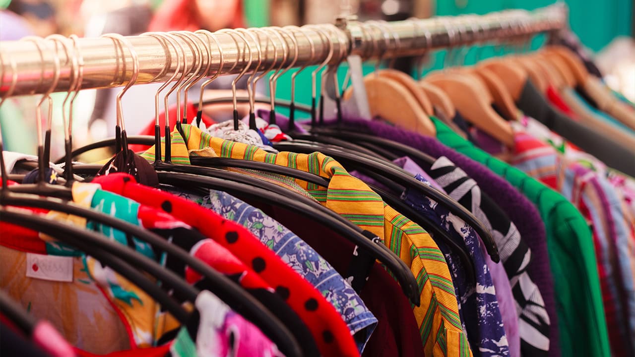 Assortment of colorful clothing at a New Jersey flea market.