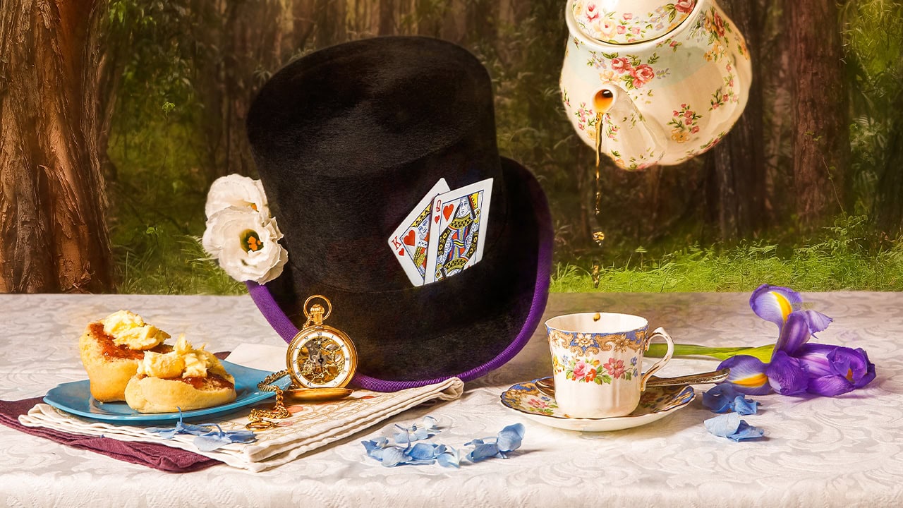 Magical tea party set with a top hat, pocketwatch, and chesire cat.