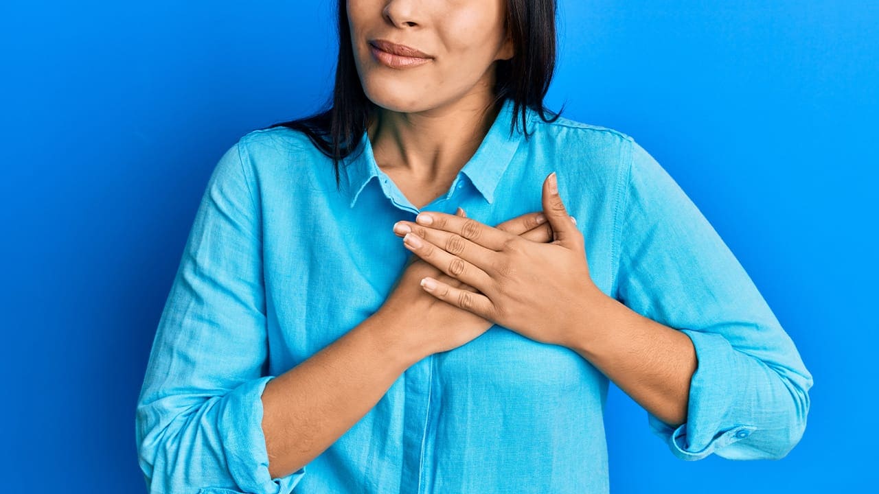 New Jersey with hand over heart portraying love and gratitude. Image produced by More Jersey.