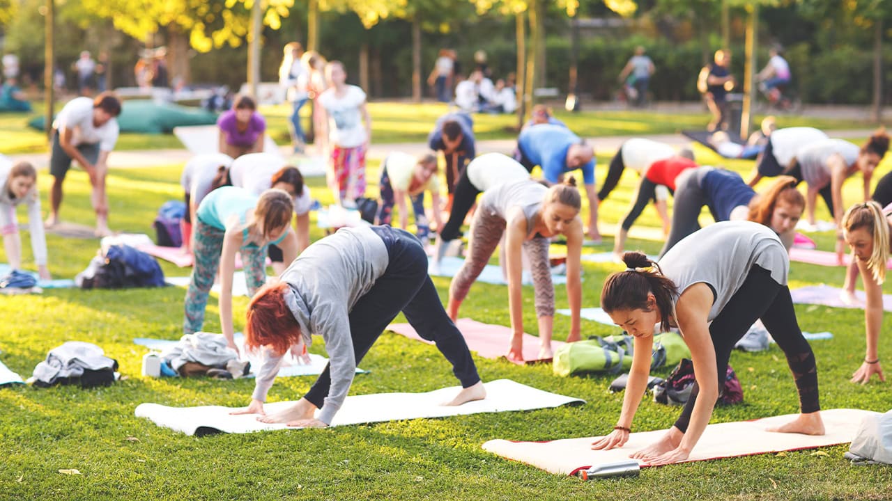 A group of residents doing yoga at local New Jersey park.