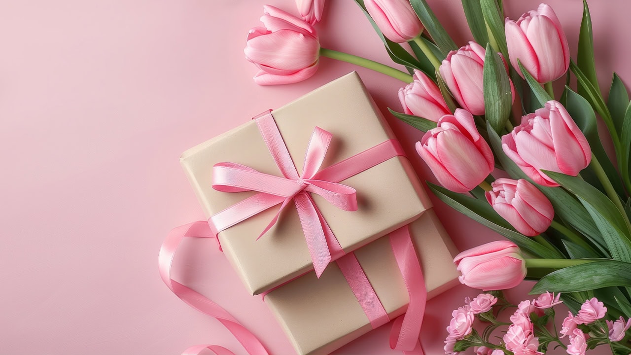 Pink Mother's Day tulips and gift boxes.