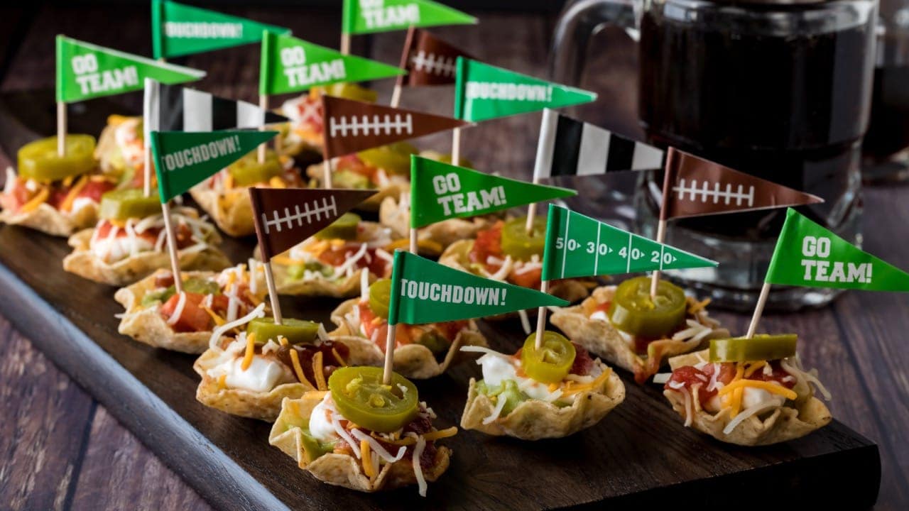 Platter of football game day appetizers at New Jersey pub event.