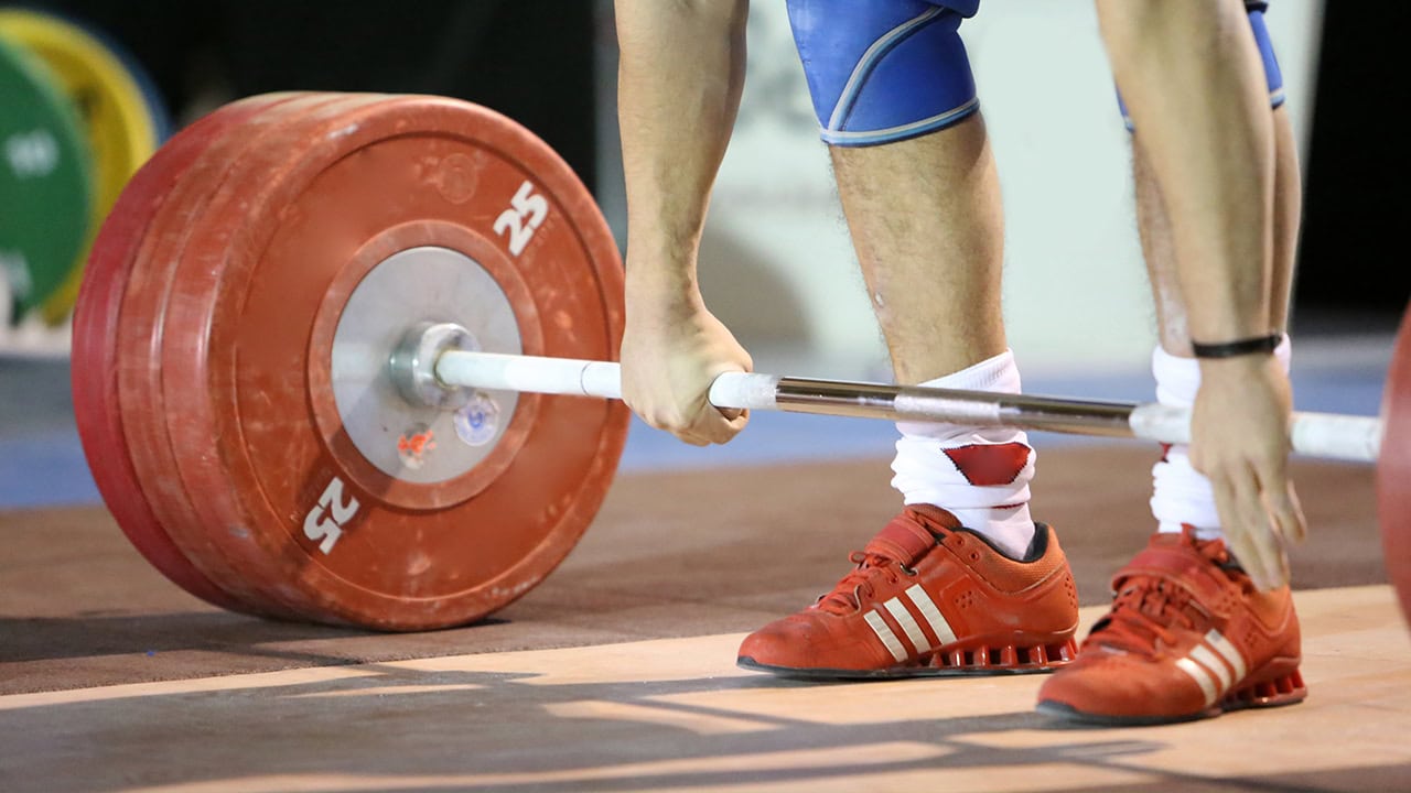 Power weightlifting competition participant preparing for lift. Image produced by More Jersey.