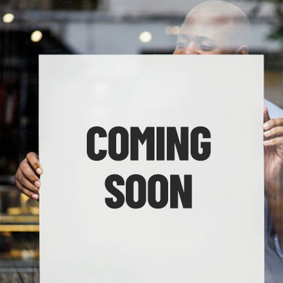 coming soon sign in shop window