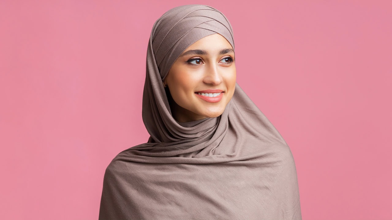 Smiling Muslim woman in hijab. Image produced by More Jersey.