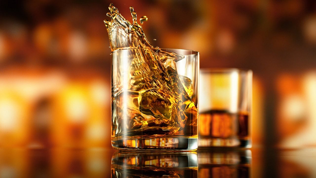 Splashing whiskey with ice. Image produced by More Jersey.