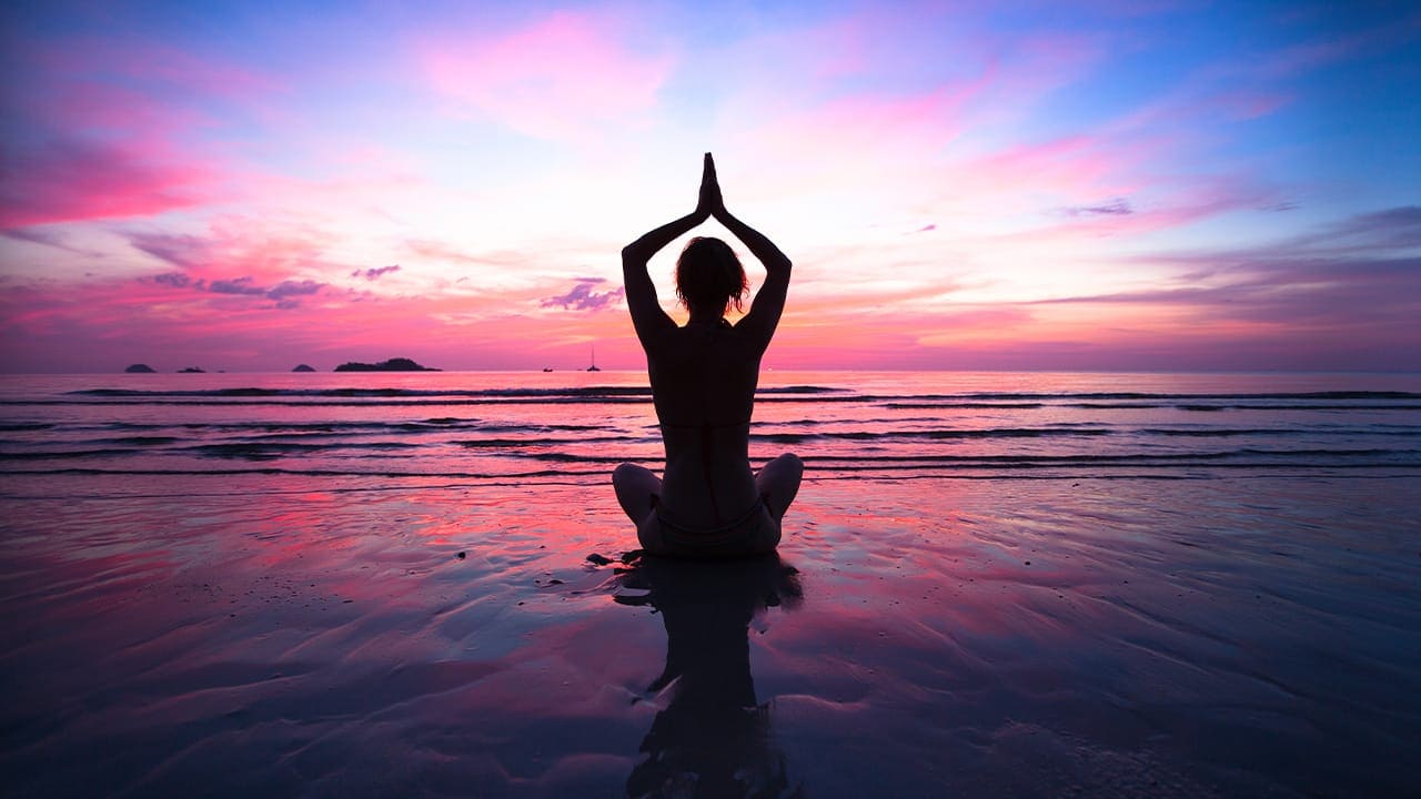 Sunset yoga at Jersey shore.