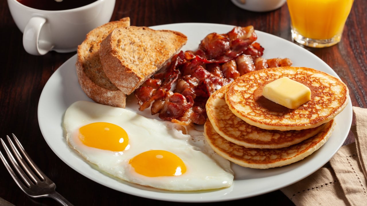 Traditional New Jersey diner breakfast special with pancakes, eggs, bacon, and toast. Image produced by More Jersey.