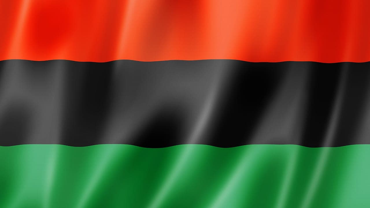 Waving African American red, black, and green striped flag. Image produced by More Jersey.