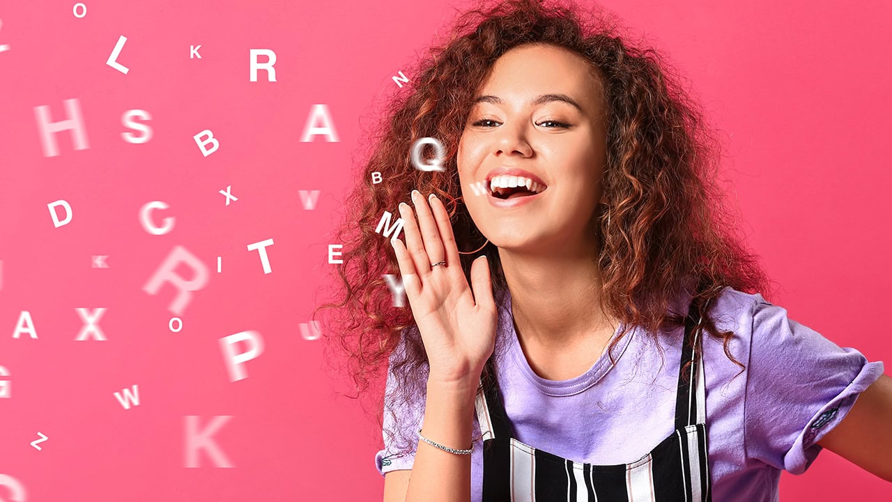 Young woman shouting letters on color background. Image produced by More Jersey.